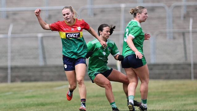<p>Sara Doyle wheels away in delight after scoring Carlow's third goal during their win over Limerick Photo: Pat Ahern</p>
