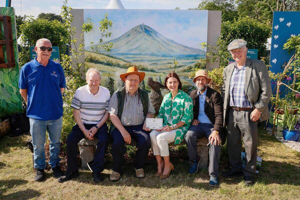 Paddy Gardiner, John Murphy, Tommy Cox, Tom Cox and Eamonn Dermody with Kerrie Gardiner, Bloom, in front of 'A landscape of transition' at Bord Bia Bloom, supported by Tirlán CountryLife.
