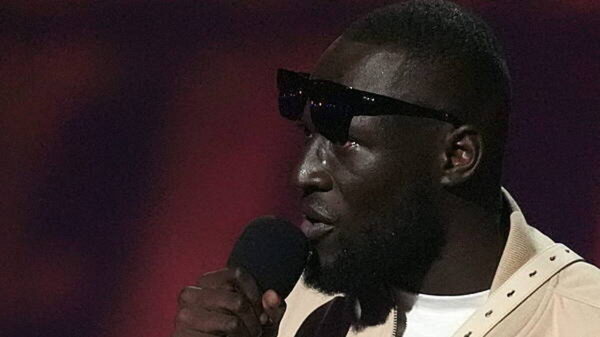 Stormzy fined for using phone while driving £400,000 Ferrari