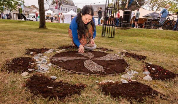 Japanese land artist Mayumi Nakabayashi works on one of her creations during Carlow Arts Festival in the grounds of Carlow College Photos: michaelorourkephotography.ie