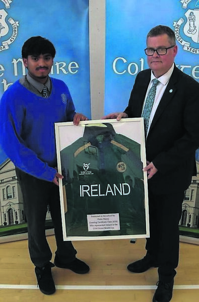 Febin Manoj presents his U19 Irish cricket team jersey to Michael Regan Febin Manoj presents his U19 Irish cricket team jersey to Michael Regan