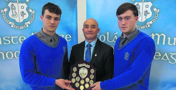 Ennae Byrne and Jack Jullian present the Senior South Leinster Shield to Mr Maye Ennae Byrne and Jack Jullian present the Senior South Leinster Shield to Mr Maye