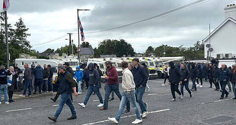 DUP MP defends photo with masked men at Scarva protest
