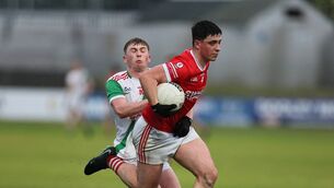 <p>Eire Og's Kieran Nolan breaks the challenge of Palatine's Josh Egan.</p> <p>Eire Og's Kieran Nolan breaks the challenge of Palatine's Josh Egan.</p>