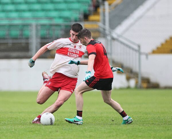 Railyard's Francie Ward and Kildavin-Clonegal's Gavin Byrne contest a ground ball. Railyard's Francie Ward and Kildavin-Clonegal's Gavin Byrne contest a ground ball.