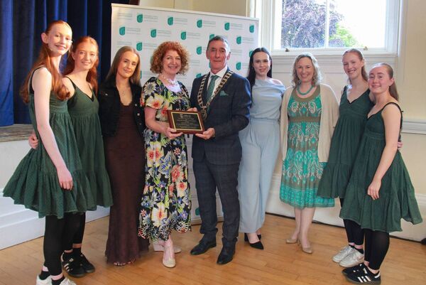 Aedeen O'Hagan, owner of the Ballet Barn with students and teachers, receiving an award from mayor Paul Doogue Aedeen O'Hagan, owner of the Ballet Barn with students and teachers, receiving an award from mayor Paul Doogue