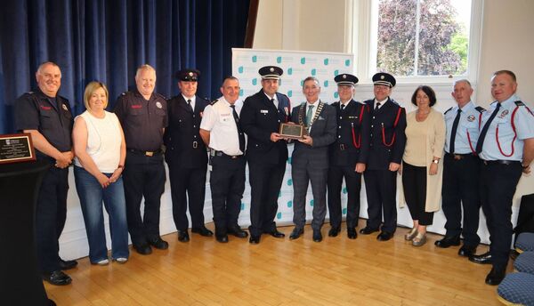 Carlow Fire and Rescue Service being presented with an award by mayor Paul Doogue Carlow Fire and Rescue Service being presented with an award by mayor Paul Doogue