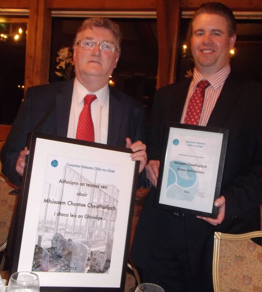 Dermot with his colleague, John McDarby accepting a special recognition award from Glór na Gael for Carlow County Museum in 2014 Dermot with his colleague, John McDarby accepting a special recognition award from Glór na Gael for Carlow County Museum in 2014