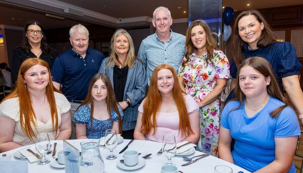 Aine Malone (seated second right) who received a 'Special Achievement' award is shown with family and Orlagh Ní Fhaoláin (Príomhoide) and Caoimhe Uí Fhearaíl (Príomhoide Tánaisteach) Gaelcholaiste Cheatharlach. Photo: michaelorourkephotography.ie Aine Malone (seated second right) who received a 'Special Achievement' award is shown with family and Orlagh Ní Fhaoláin (Príomhoide) and Caoimhe Uí Fhearaíl (Príomhoide Tánaisteach) Gaelcholaiste Cheatharlach. Photo: michaelorourkephotography.ie