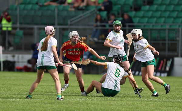 Carlow midfielder Sarah Sheehan is surrounded by a swarm of Meath players. Carlow midfielder Sarah Sheehan is surrounded by a swarm of Meath players.