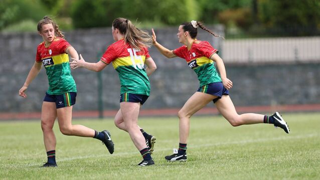 <p>Clíodhna Ní Shé and Bronagh Nolan congratulate Aibhna Kiernan on scoring a goal in the first half against Sligo	Photo: Pat Ahern</p>