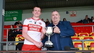 <p>Carlow GAA Chairman John McDonald presents the Division 2 trophy to Ballon captain Conor Bolger on Sunday in Netwatch Cullen Park.</p> <p>Carlow GAA Chairman John McDonald presents the Division 2 trophy to Ballon captain Conor Bolger on Sunday in Netwatch Cullen Park.</p>