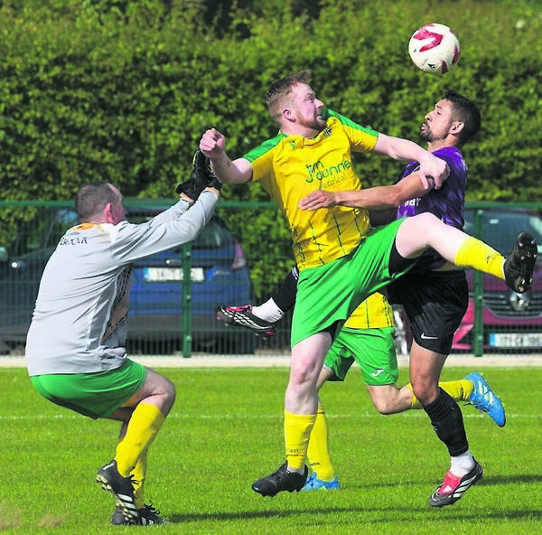Crettyard’s Denis Byrne and Shane Benwick and Bagenalstown’s Martin Bambrick