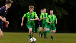 <p>Carlow's Tadgh Smith Tumelty in action against the Midlands League. Photo: Keith Wiseman</p>