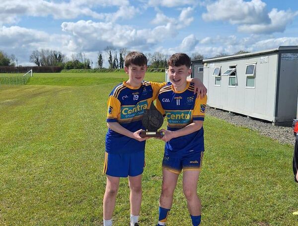 St Patrick's players celebrate receiving the Division 1 Féile title.
