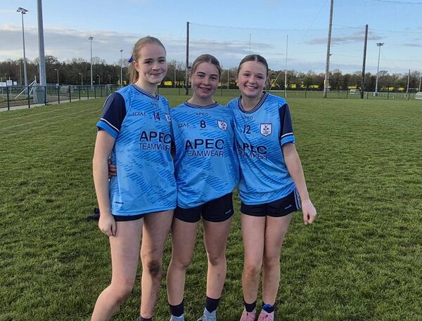 St Anne's players celebrate an amazing Féile victory.