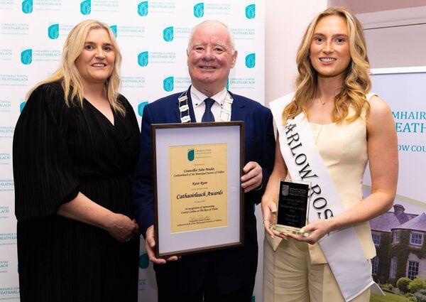 Cllr Pender presents an award to Carlow Rose Katie Ryan. Katie was acommpanied to the awards night by her mother, Geraldine Cllr Pender presents an award to Carlow Rose Katie Ryan. Katie was acommpanied to the awards night by her mother, Geraldine