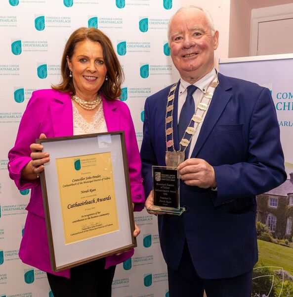 Norah Ryan, president of Carlow County Chamber of Commerce being presented by cllr John Pender during the Tullow Municipal District Cathaoirleach awards in Teach Bhríde, Tullow Norah Ryan, president of Carlow County Chamber of Commerce being presented by cllr John Pender during the Tullow Municipal District Cathaoirleach awards in Teach Bhríde, Tullow