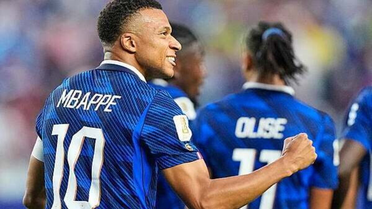 Kylian Mbappe adds two more to tally in storm-delayed win over Iraq
