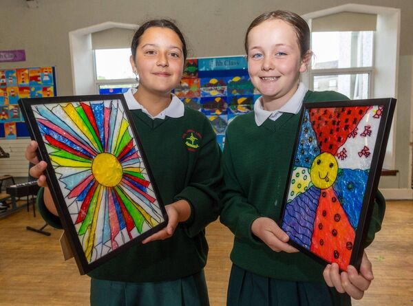 Leyla Condescu and Creagh Byrne pictured with their art work 