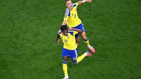 Japan and Sweden share points to book places in last 32 of World Cup