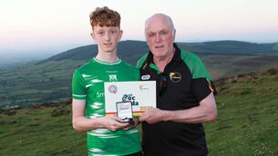 <p>Keelan O'Carroll (St Mullins) receiving his prize after winning the Carlow Poc Fada and he will now go on to represent Carlow in Leinster on Saturday Photo: Pat Ahern</p>
