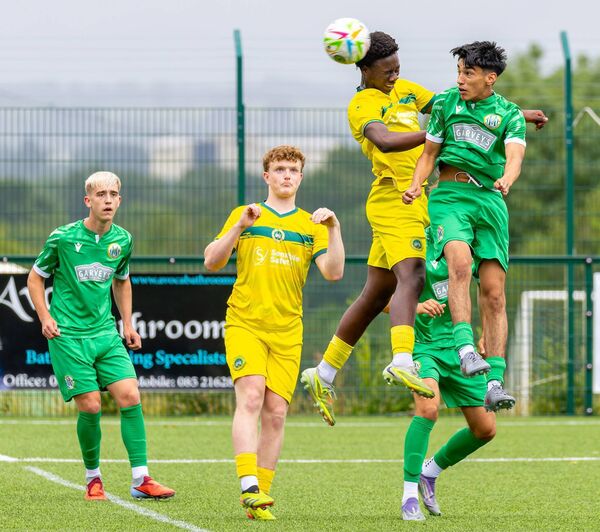 CK United’s Axel O’Rock out jumps Kerry’s Kieran Shane-O’Donovan. Pic: © Michael O'Rourke Photography 2026