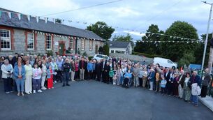 <p>Fr Jim celebrates with his parishioners in Ballon Community Hall </p>