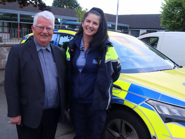 Monsignor John McEvoy with Garda Eugena Brennan Monsignor John McEvoy with Garda Eugena Brennan