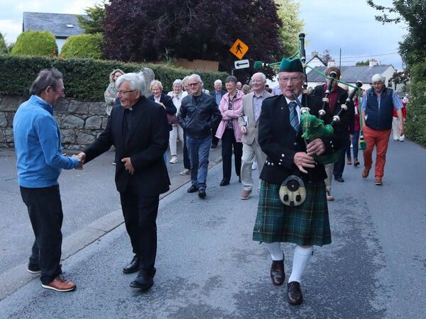 Piper Pat Lalor leads the crowd up to Ballon Community Centre where the party was held Piper Pat Lalor leads the crowd up to Ballon Community Centre where the party was held