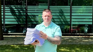 <p>Sinn Féin representative in Laois, Aaron Kelly, holding submissions against the proposed cycle scheme in Graiguecullen. </p> <p>Sinn Féin representative in Laois, Aaron Kelly, holding submissions against the proposed cycle scheme in Graiguecullen. </p>