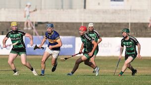 <p>Bagenalstown trio Darragh Nolan, Niall Bolger and Paddy Abbey chase down Ballinkillen's  Ciaran Whelan</p>