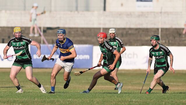 <p>Bagenalstown trio Darragh Nolan, Niall Bolger and Paddy Abbey chase down Ballinkillen's  Ciaran Whelan</p>