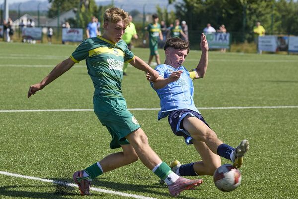 CK United’s Philip Kacprzak cross is blocked by UCD’s Nathan O’Neill Photo: Michael O'Rourke