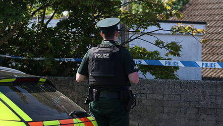 Police remain at the scene after three relatives found dead in family home