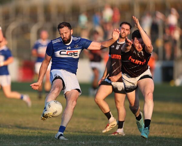 Fenagh's Jamie McCabe tries to block the shot of Old Leighlin's Seamus Kinsella. Fenagh's Jamie McCabe tries to block the shot of Old Leighlin's Seamus Kinsella.