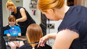 <p>Katie Murphy, a stylist with Bevelle Hair Salon in Bagenalstown, cuts Katelynn Walsh's hair Photos: Michael O'Rourke Photography</p> <p>Katie Murphy, a stylist with Bevelle Hair Salon in Bagenalstown, cuts Katelynn Walsh's hair Photos: Michael O'Rourke Photography</p>