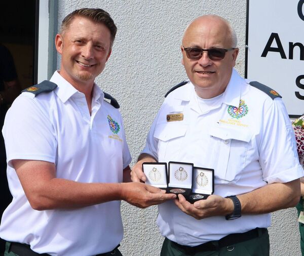 Mark Murphy presents Martin with his long service medals for ten, 20 and 30 years' service Mark Murphy presents Martin with his long service medals for ten, 20 and 30 years' service