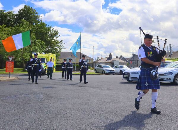 Piper Barry Redmond leads the colour party and Martin Byrne to the NAS base in Carlow Piper Barry Redmond leads the colour party and Martin Byrne to the NAS base in Carlow