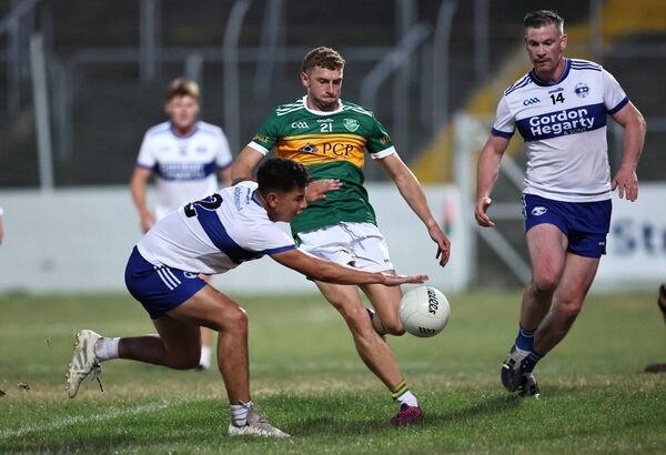 Grange's Matthew Bird taps the ball away from Rathvilly's Diarmuid Gavin.
