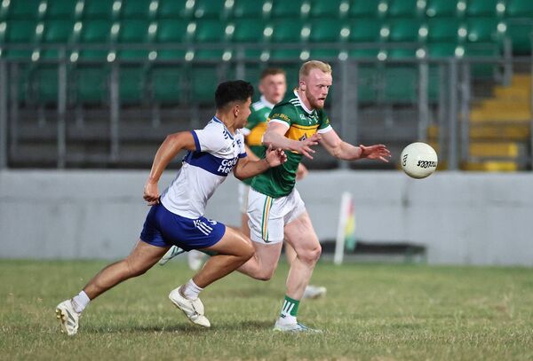 Conor Doyle, who came off the bench to score twice for Rathvilly, beats Grange's Matthew Bird to the ball late on.