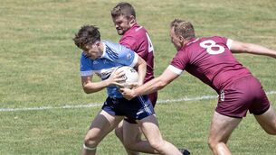 <p>Allenwood's Cormac Denagher protects the ball under strong pressure from Leixlip duo Kevin Connelly and Tommy Moolick Photo: Sean Brilly</p> <p>Allenwood's Cormac Denagher protects the ball under strong pressure from Leixlip duo Kevin Connelly and Tommy Moolick Photo: Sean Brilly</p>