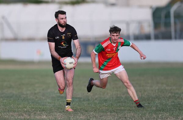Palatine's Luke Campion chases down Leighlinbridge captain Liam Brennan. Palatine's Luke Campion chases down Leighlinbridge captain Liam Brennan.