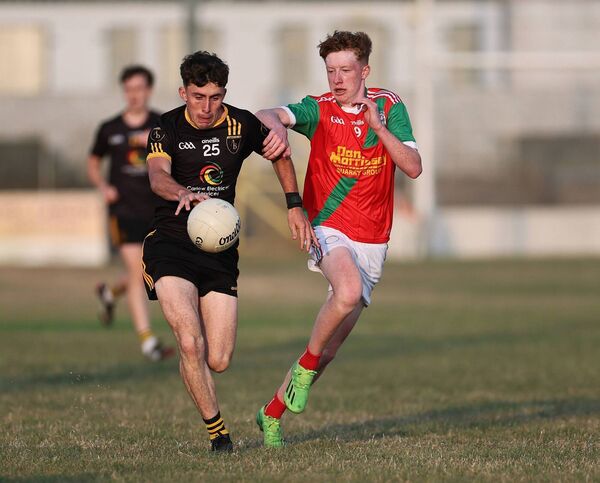 Palatine captain Conor Buggy chases down Conor Delacey of Leighlinbridge late in the second half. Photos: Pat Ahern. Palatine captain Conor Buggy chases down Conor Delacey of Leighlinbridge late in the second half. Photos: Pat Ahern.