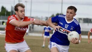 <p>Old Leighlin’s Aaron Amond tries to shrug off the attentions of Éire Og’s Kyle O’Byrne Photo: Michael O’Rourke</p> <p>Old Leighlin’s Aaron Amond tries to shrug off the attentions of Éire Og’s Kyle O’Byrne Photo: Michael O’Rourke</p>