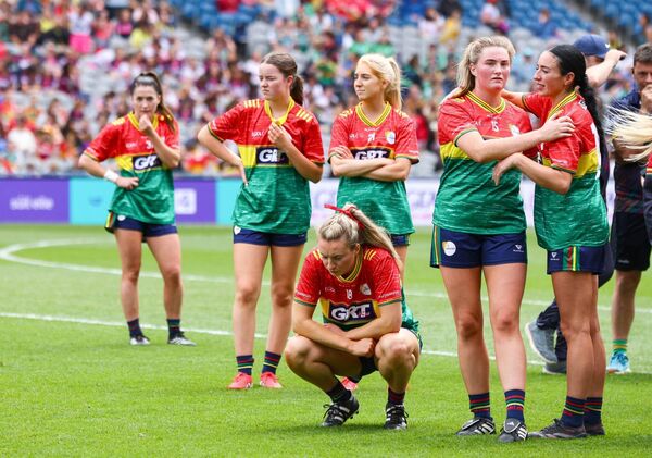 The Carlow players left dejected after the final whistle.