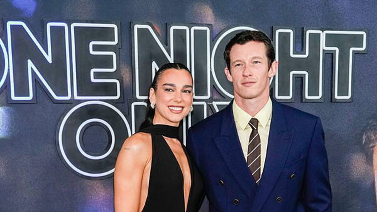 Dua Lipa and Callum Turner make their red carpet debut at film premiere