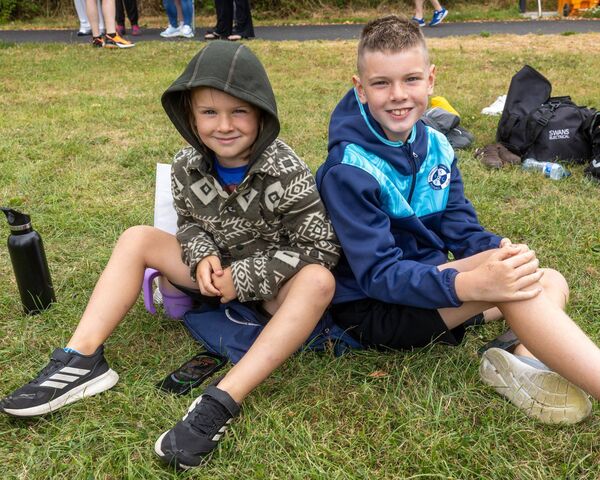 Tyler and Kyle Foley watching as the soccer games were played out Tyler and Kyle Foley watching as the soccer games were played out