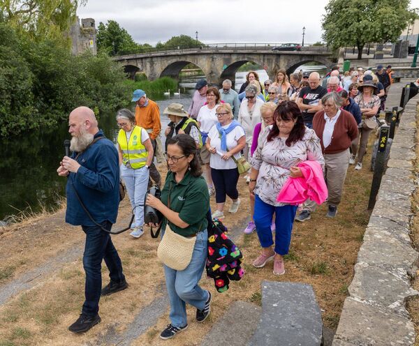 Fiann Ó Nualláin leads the talk on 'Plants, place and wellbeing' along the River Barrow in Leighlinbridge as part of the Carlow Garden Festival Photos: Michael O'Rourke