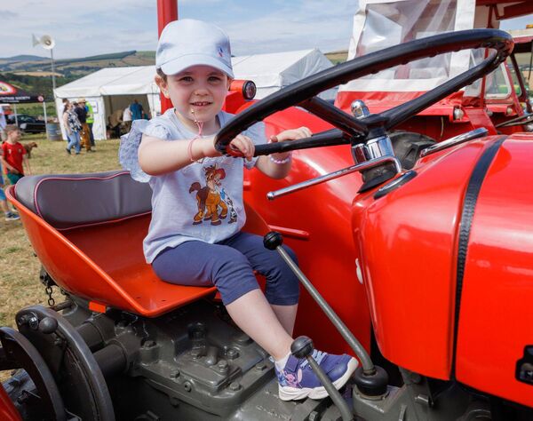 Molly Keogh behind the wheel of a vintage Massey Ferguson tractor Molly Keogh behind the wheel of a vintage Massey Ferguson tractor